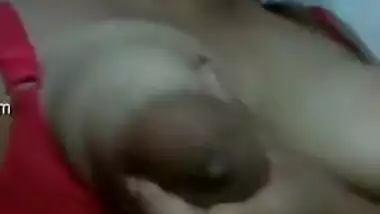 Relaxed Indian gal whips out jugs dreaming about porn sex with BF
