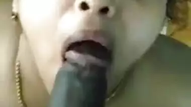 Beautiful aunty sucking big black cock with full dedication and eye contact