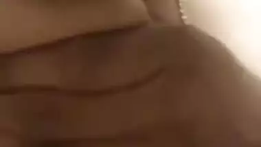Lassie takes off purple top revealing sexy Indian nipples in porn video