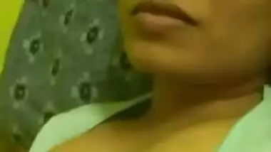 desi mom pulls green T-shirt down and flashes dark nipples in sex show