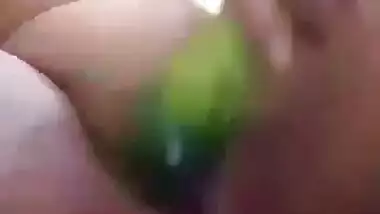 Unsatisfied Bhabhi masturbating with cucumber