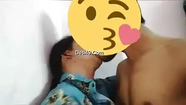 Desi girl in floral shirt kisses porn partner being covered with a smile