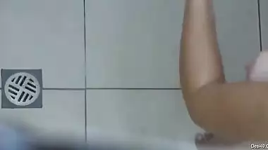 Indian girl takes a shower without knowing about hidden camera filming her