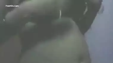 Perverted Indian guy sneakily films wife in improvised porn video