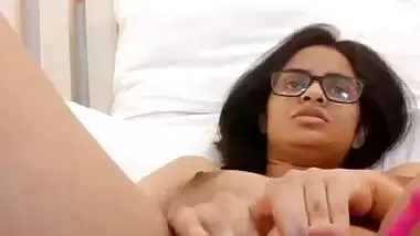 Sexy college girl showing her boobs and fingering pussy