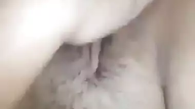 Beaautiful girl fingering the tight hole of her pussy