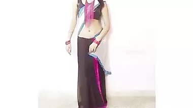 young girl teaching how to wear saree 1